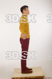 Whole body yellow sweater red trousers brown shoes of Sidney…